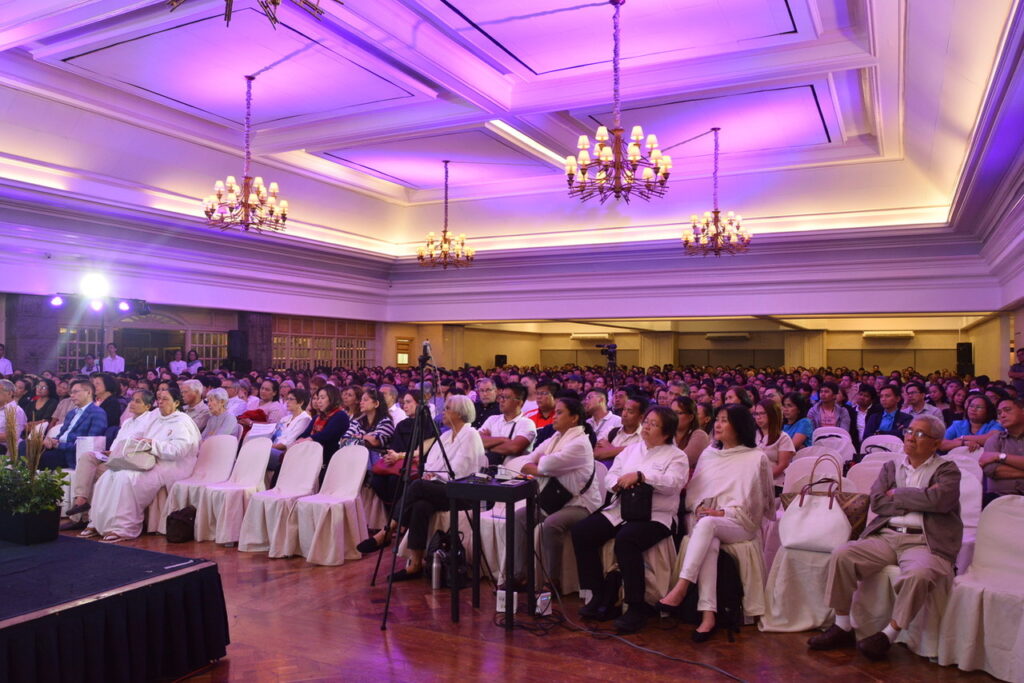 Participants listen to BK Jayanti talk about mental health during a public program in 2019 at the Makati Sports Club.